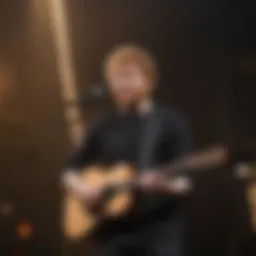 Ed Sheeran performing on stage with vibrant lights