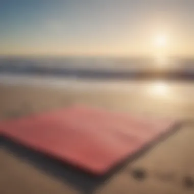 Close-up of a tranquil beachside yoga mat with waves in the background